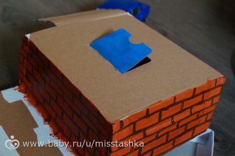 Гараж из коробки для игрушечной машинки
