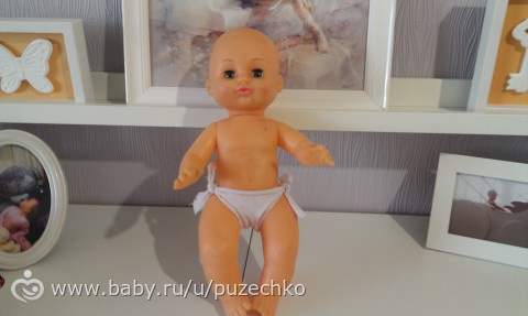 Дали в саду куклу, попросили одеть....