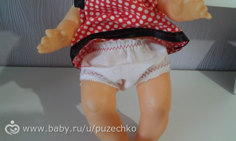 Дали в саду куклу, попросили одеть....