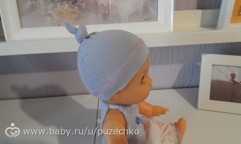 Дали в саду куклу, попросили одеть....